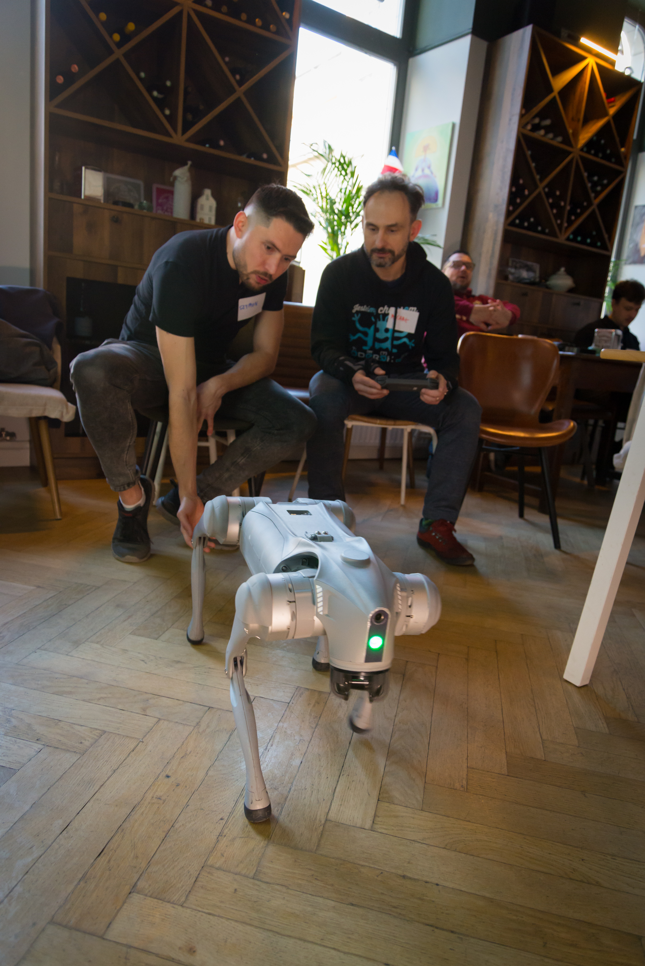 Engineers with Unitree Go2 robot walking